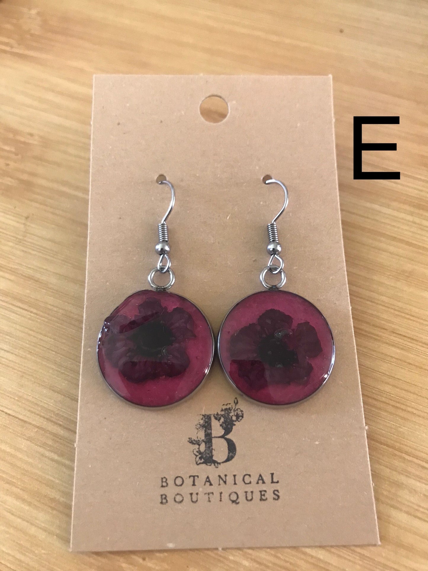 Coloured background dangling earrings
